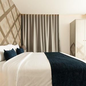 Kamer "Premier" met een King Size Bed op de Hoek
